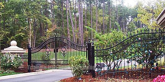 wide angle view of the ornamental iron gates at the garden 