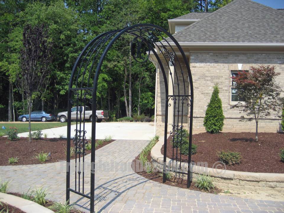 wrought iron gate installed at the road