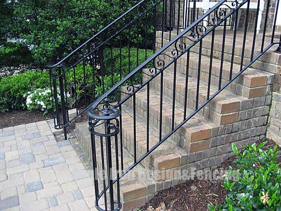 wrought iron railing at the stairs outside house