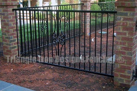 custom iron fencing at the gate