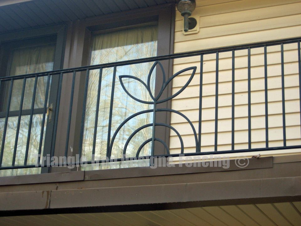 closeup view of the custom iron railing at the balcony 