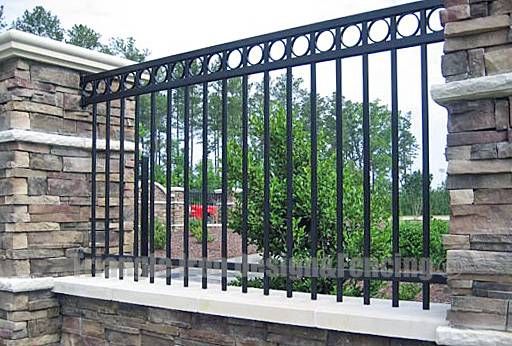 view of the iron fencing installed in the wall