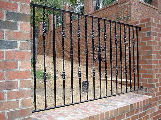 wrought iron fencing installed at the gate