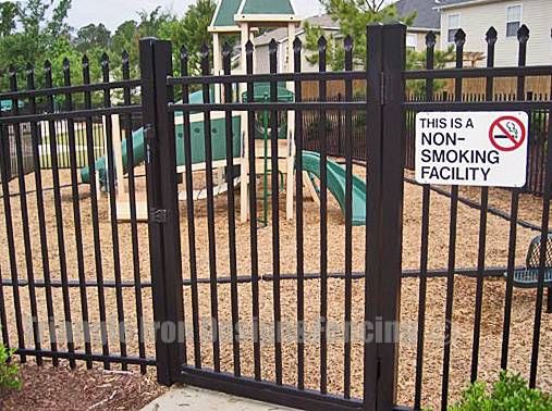 wrought iron fencing installed near the playground