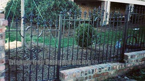 wrought iron fencing installed in the wall