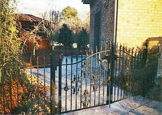 view of the custom iron gate